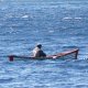 81- Un pecheur dans sa barque de tole 